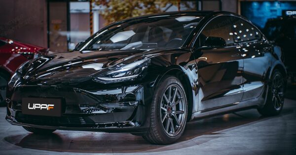 UPPF Mirror Black installed on a Tesla