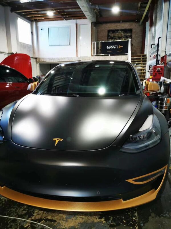 Hood view of UPPF Satin Black installed on a Tesla