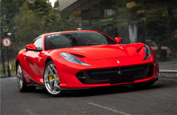 Front left angle of Passion Red UPPF installed on a Ferrari